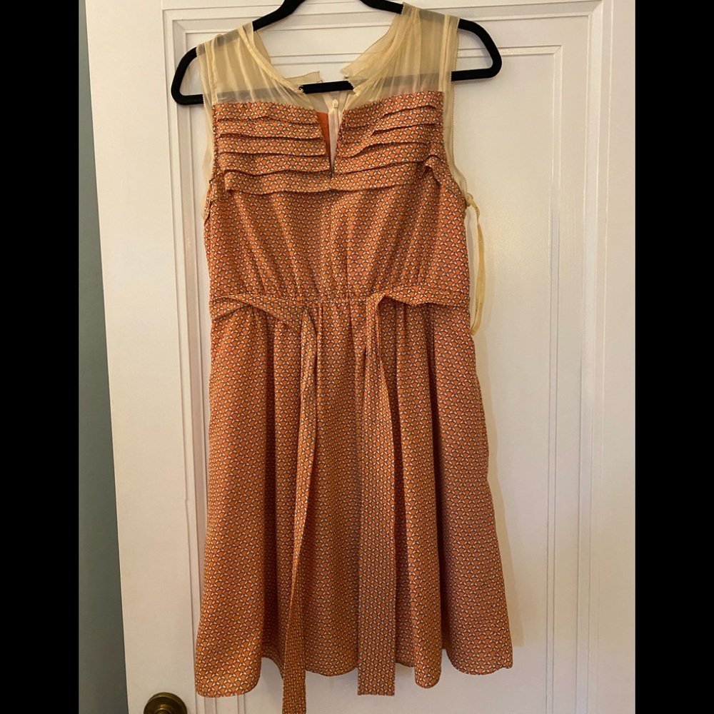Easley brand dress size medium. Cream, orange and brown pattern.